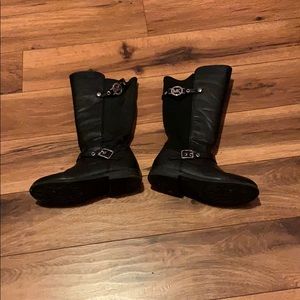 Black Michael Kors boots.